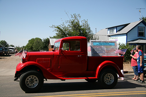 Stategic Vision Poster on back of Don Triola's truck