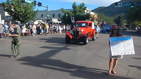 Root and Allison walking in July 4th Durango Parade